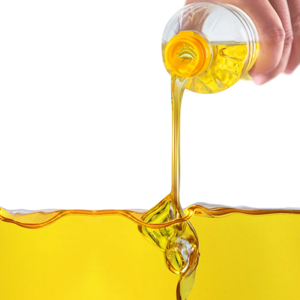 vegetable,oil,pouring,on,vegetable,oil,background