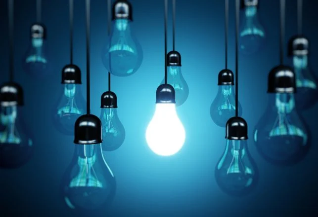 idea,concept,with,light,bulbs,on,a,blue,background